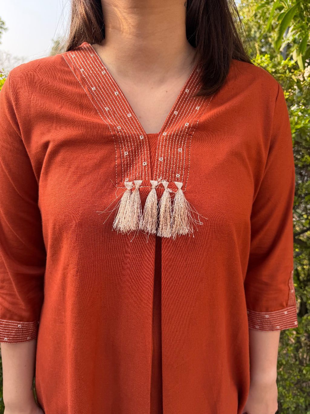 Rust Bloom Tassel A-line Kurta neck detail by Sanskritam