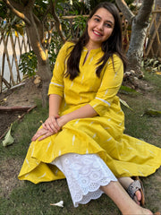 Mustard embroidered A-line kurta with pockets.