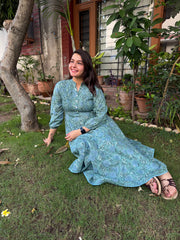 Teal Green Floral Pintucks A-line Kurta sitting pose by MySanskritam