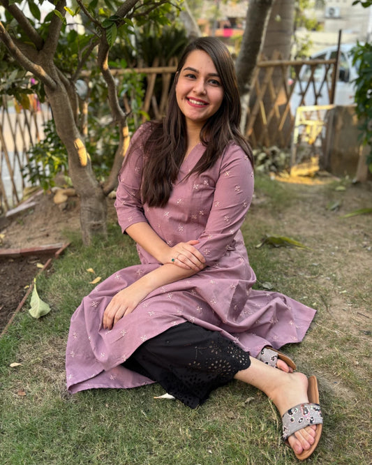 Onion pink embroidered A-line kurta with pockets.