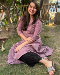 Onion pink embroidered A-line kurta with pockets.