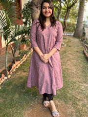Onion pink embroidered A-line kurta with pockets.
