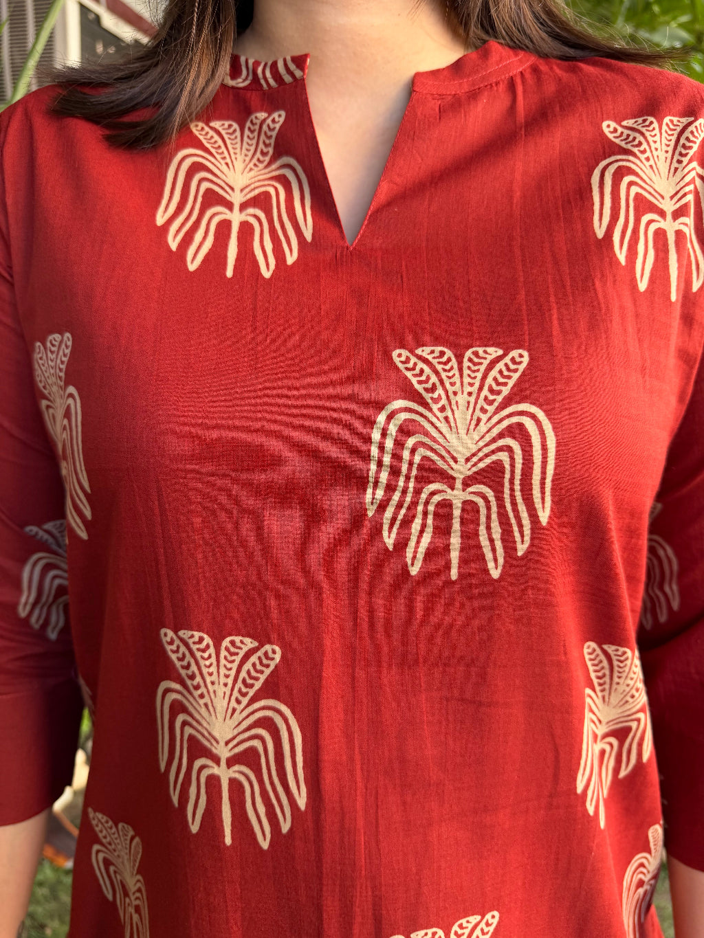 Rust Buta Ban Neck Kurta up close by MySanskritam
