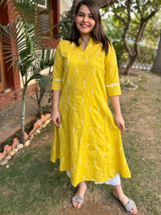 Mustard embroidered A-line kurta with pockets.