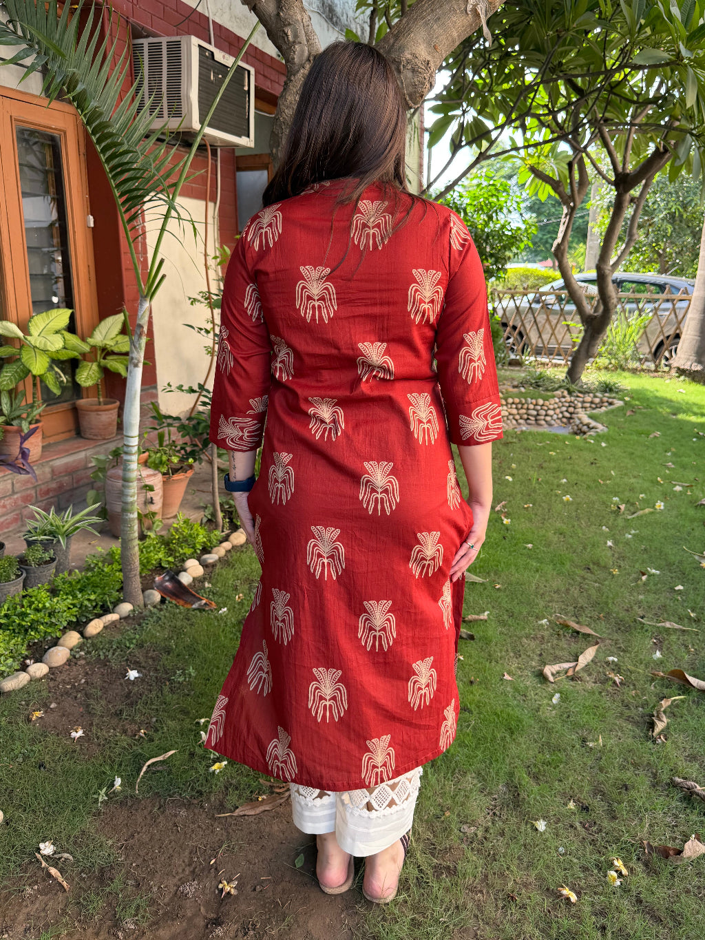 Rust Buta Ban Neck Kurta from the back by MySanskritam
