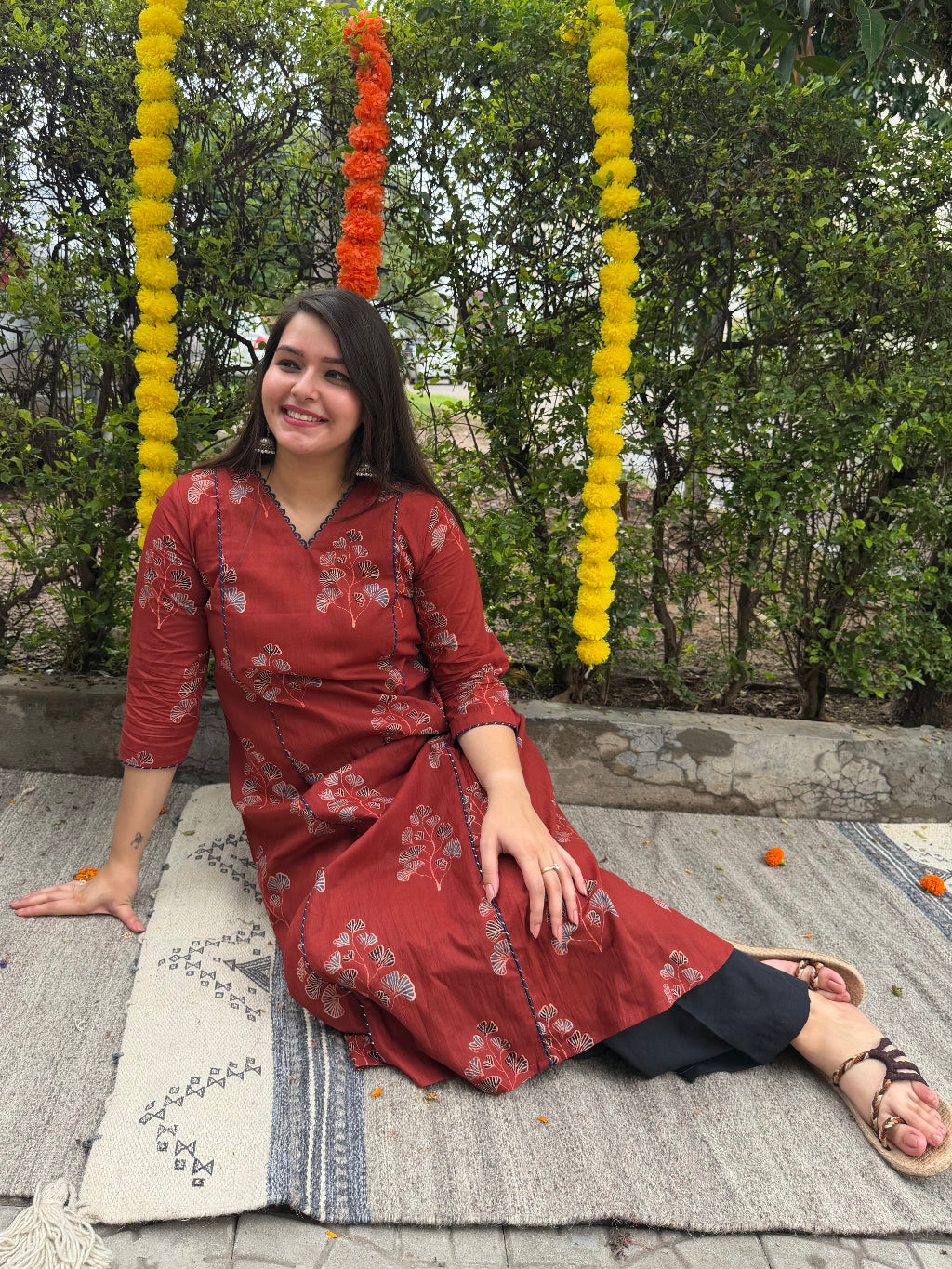 Maroon Buta A-line Kurta With Pocket sitting pose by MySanskritam