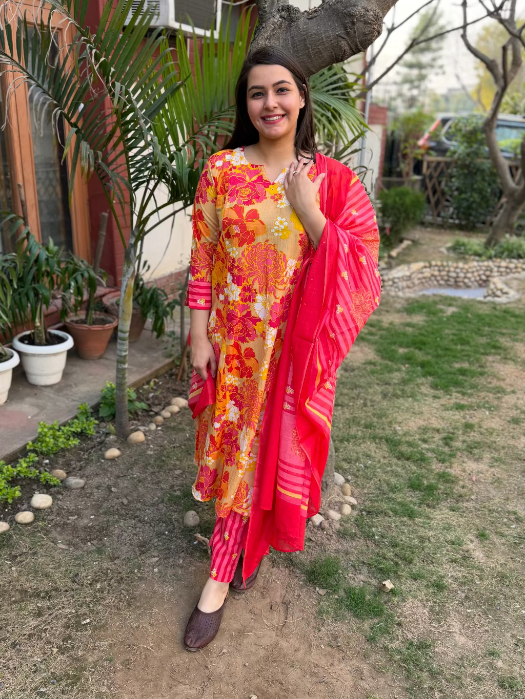 Orange Multi Flower A-line Suit Set by Sanskritam