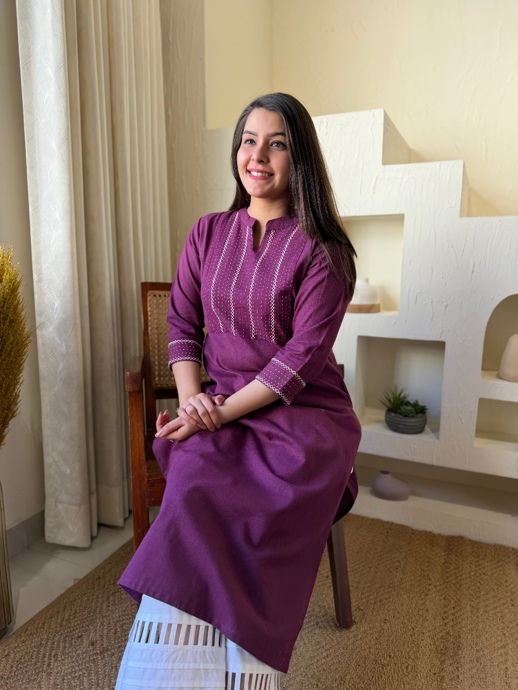 Wine Kantha Embroidered Yoke Kurta sitting pose by Sanskritam