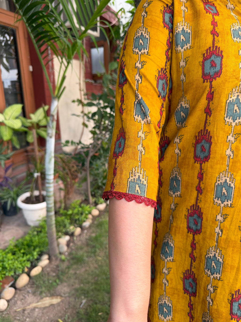 Deep mustard ikkat print kurta sleeve detail by MySanskritam