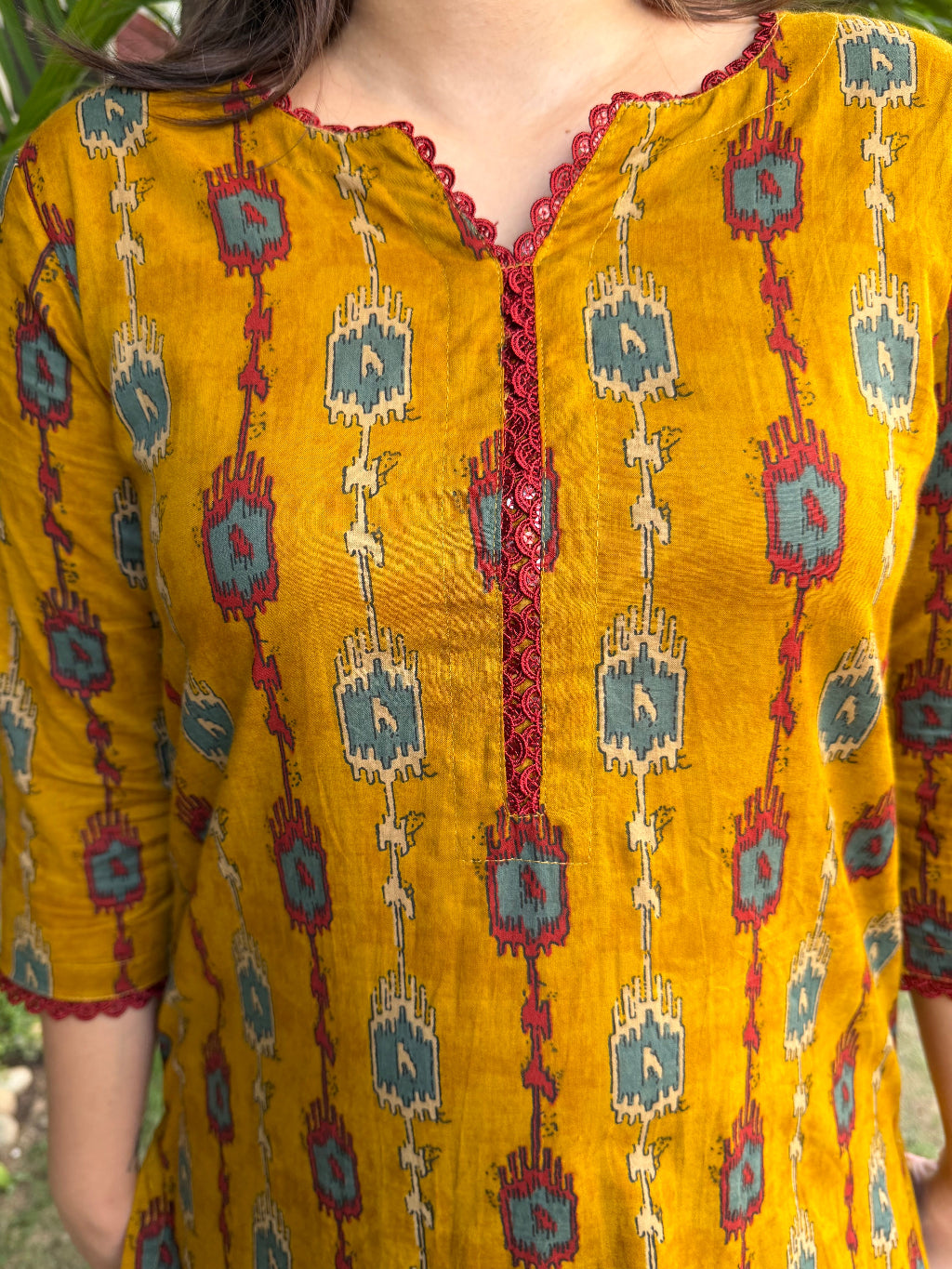 Deep mustard ikkat print kurta close up by MySanskritam