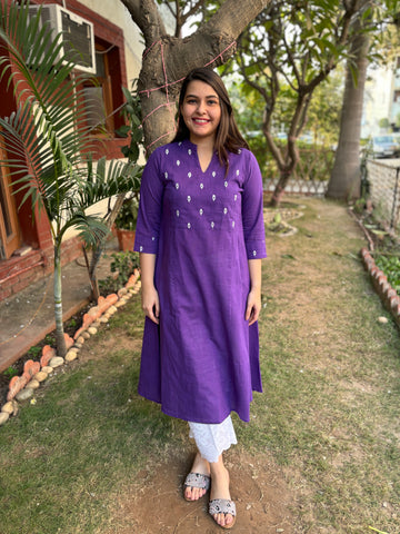 Purple embroidered yoke A-line kurta with pockets.