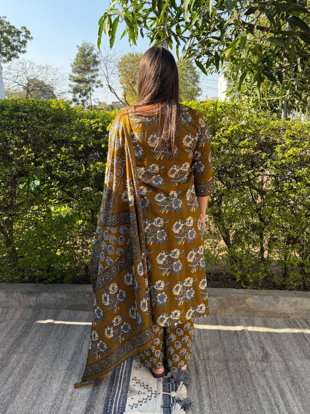 Mehendi green Full Suit Set from the back by Sanskritam