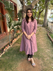 Onion pink embroidered A-line kurta with pockets.