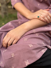 Onion pink embroidered A-line kurta with pockets.