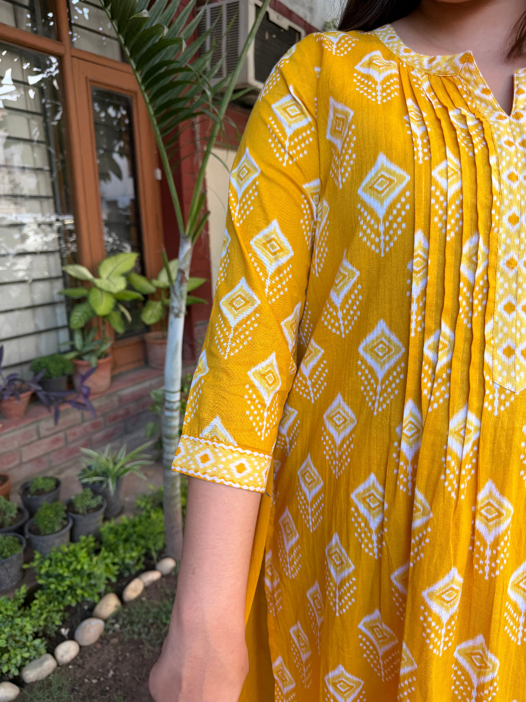 Yellow Ikkat Print Pintucks Suit Set sleeve by MySanskritam