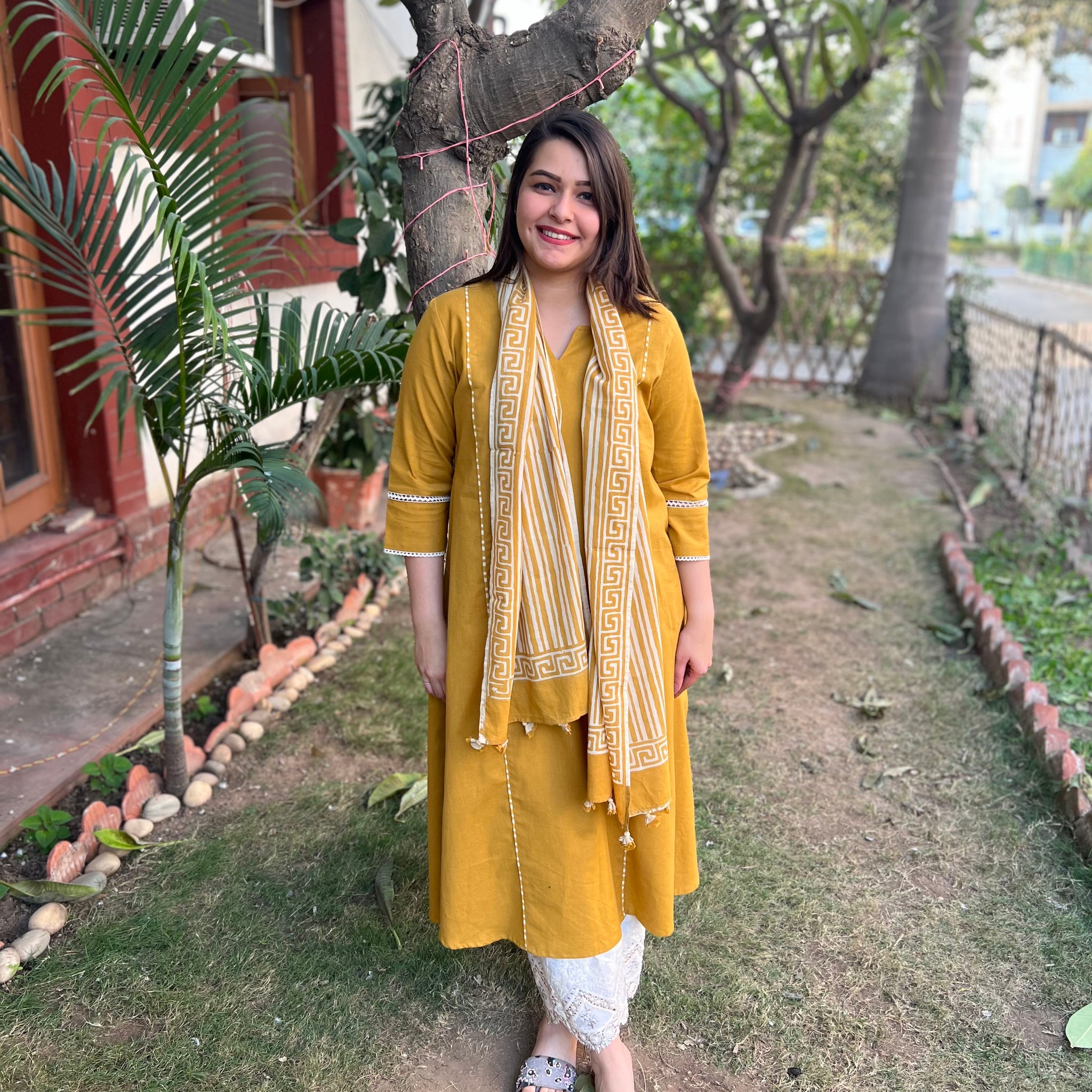 Mustard A-Line kurta with Scarf