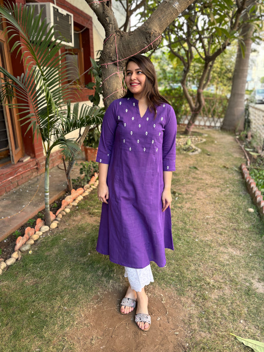 Purple embroidered yoke A-line kurta with pockets.