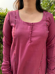 Pink solid A-line chudi sleeve kurta with pothli button