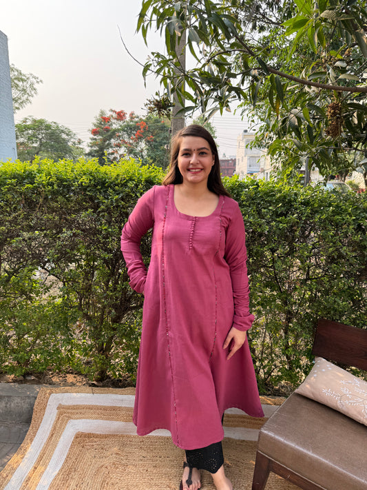 Pink solid A-line chudi sleeve kurta with pothli button