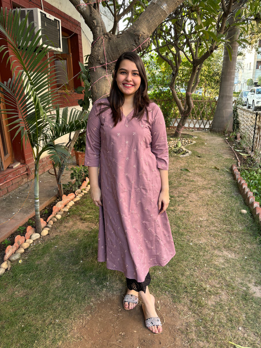 Onion pink embroidered A-line kurta with pockets.