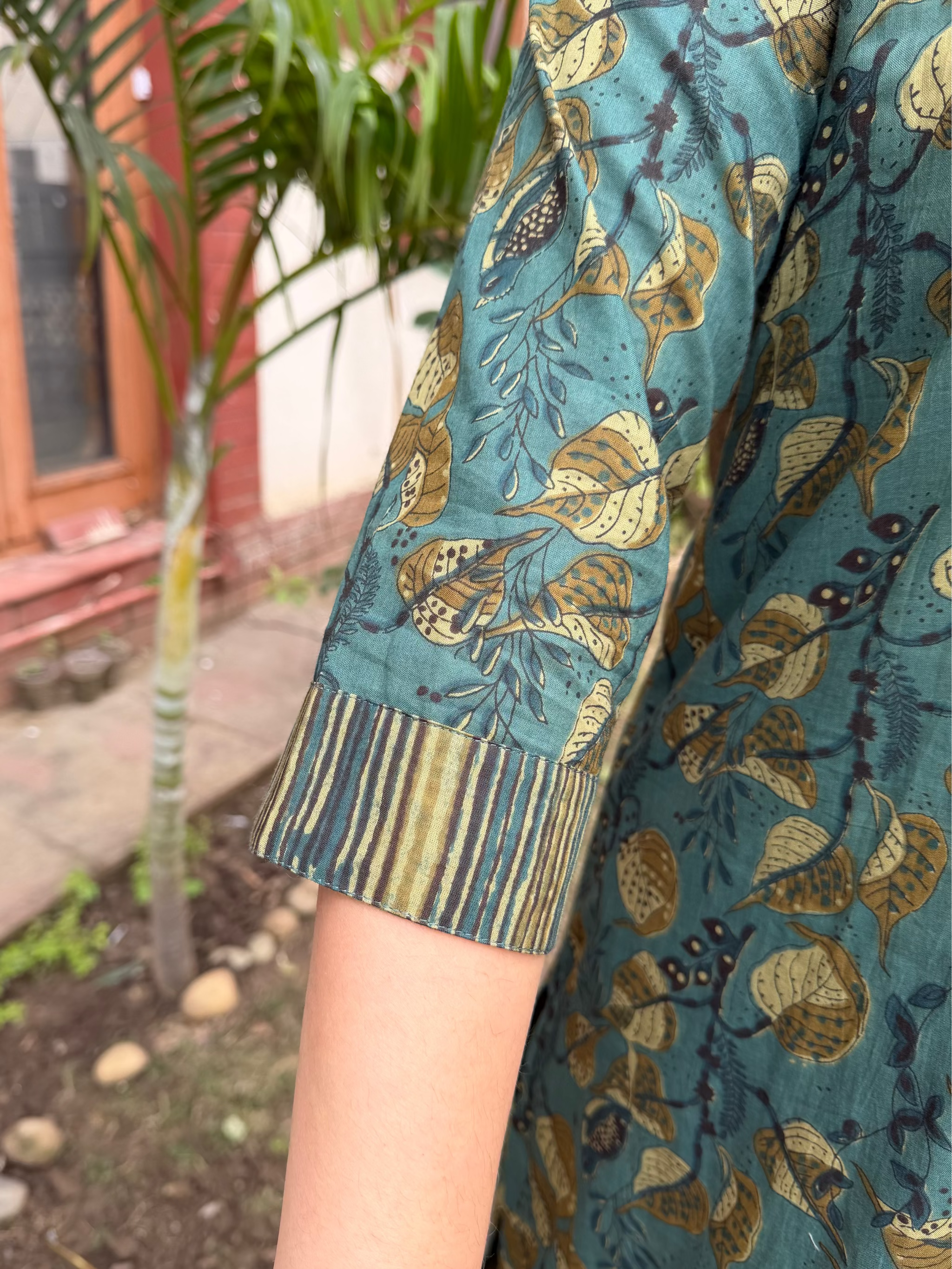 Green Floral Ajrakh Co-ord Set Kurta detailing by MySaskritam