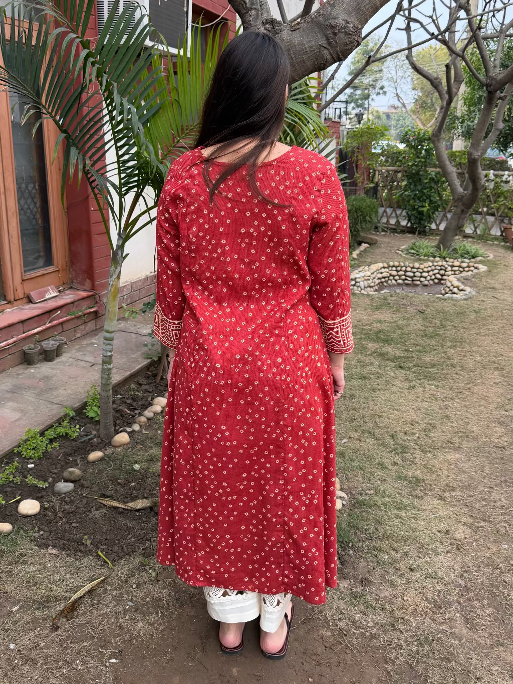 Rust Bandhini Textured Aline Kurta from the back by MySanskritam