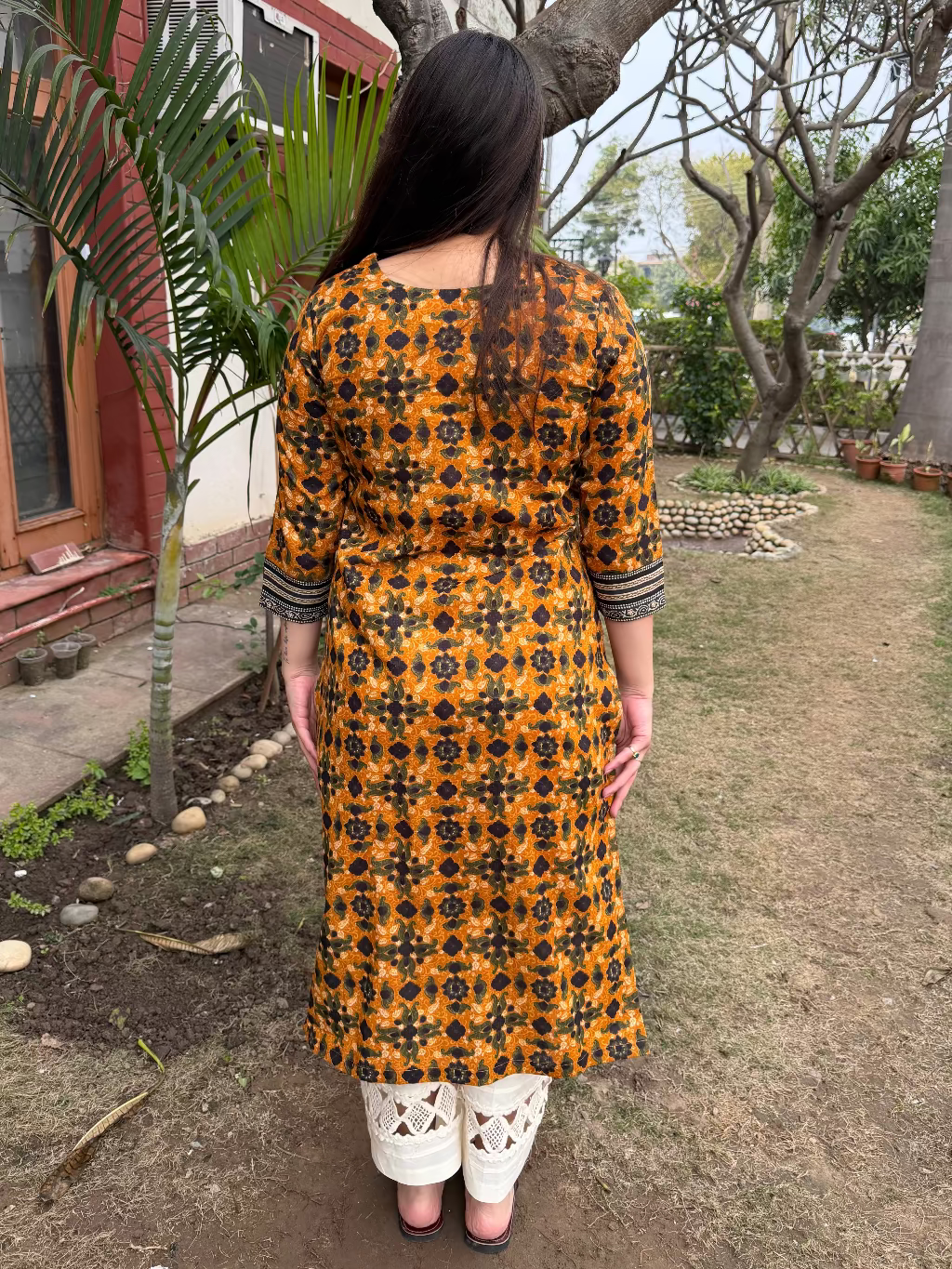 Mustard Floral Printed Kurta from the back by MySanskritam