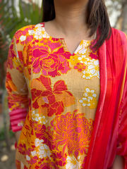 Orange Multi Flower A-line Suit Set close up by Sanskritam