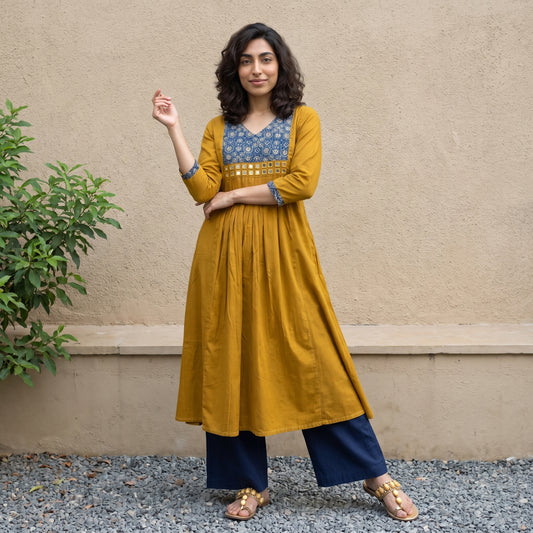 Mustard A-line mirror work kurti